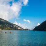 A panoramic view of mist-covered valleys at hill station near Nainital.