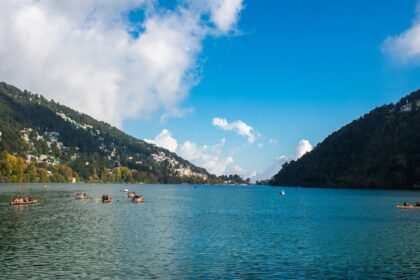 A panoramic view of mist-covered valleys at hill station near Nainital.