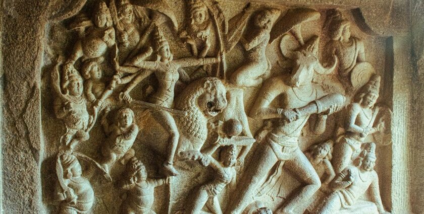 Intricate ancient Indian stone relief sculpture with detailed carvings of figures