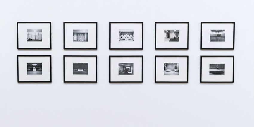 A view of frames hung in an art gallery, perfect for people looking for what to do in Malleswaram.