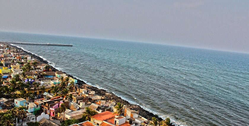 An aerial view of Pondicherry Rock Beach with waves crashing onto the rocky shore.