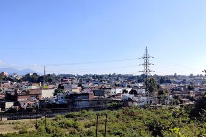 An image showing a scenic view of Dehradun, highlighting places to visit near Dehradun.