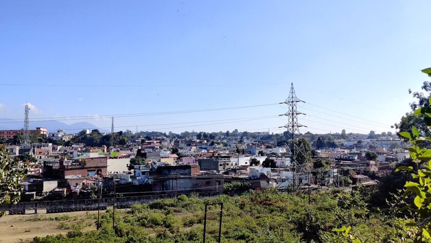 An image showing a scenic view of Dehradun, highlighting places to visit near Dehradun.