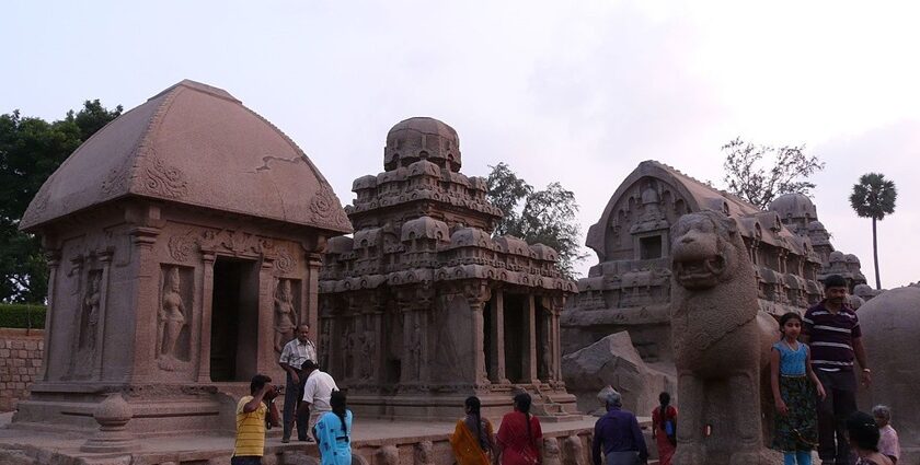 The outdoor area of the Ratha Temple, with a crowd of people seeking blessings.