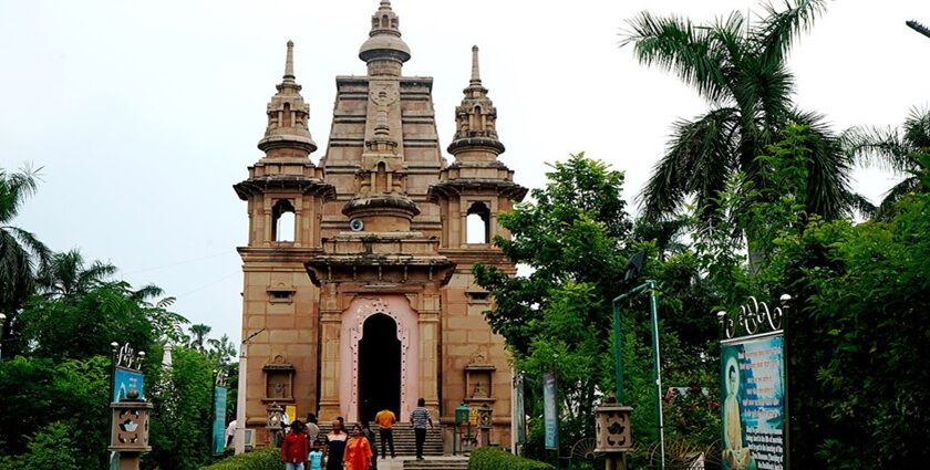 Front view of the Buddhist temple at Sarnath, showcasing its architectural beauty and amazing surroundings.