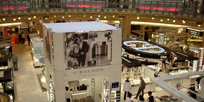 Contemporary shopping mall with global brands, cafes, and movie theatres.