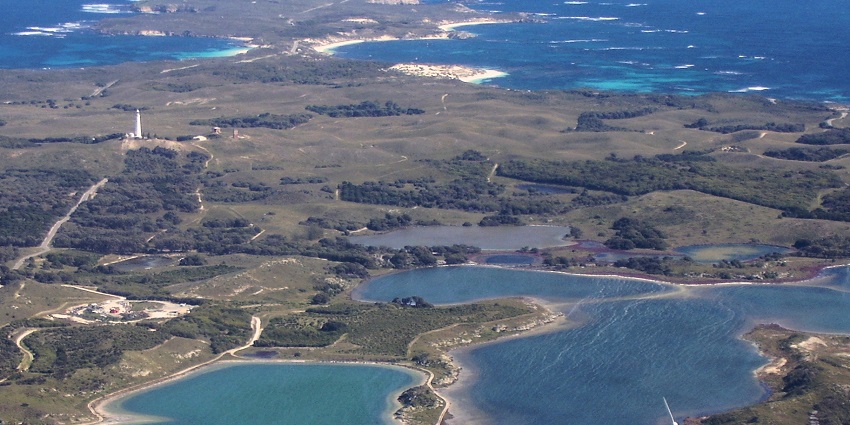 Aerial view showcasing the beaches and rugged landscapes of Rottnest Island.