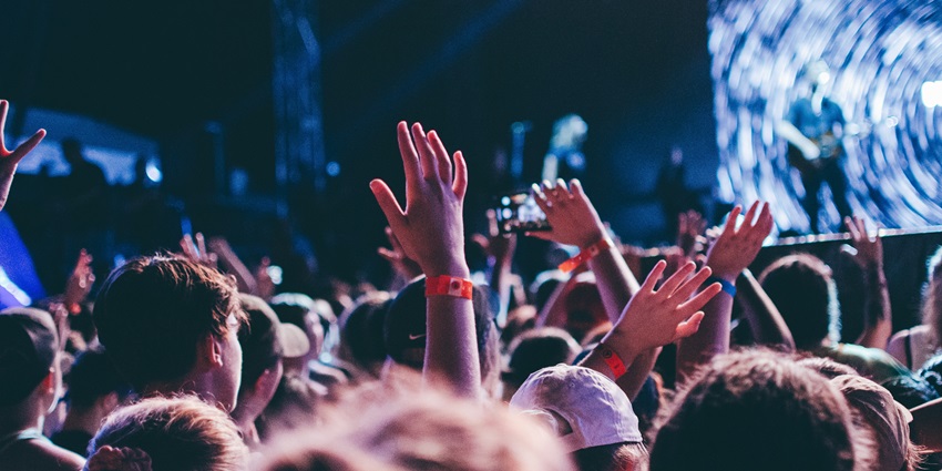 A Famous DJ performing at one of the best music festivals in Melbourne in a cinema style.