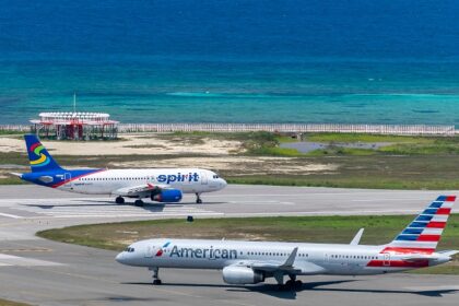 A view of American Airlines aircraft on the runway preparing for departure in Montego Bay.