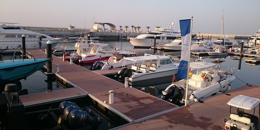 Modern marina offering luxury yachts, dining, and waterfront experiences.