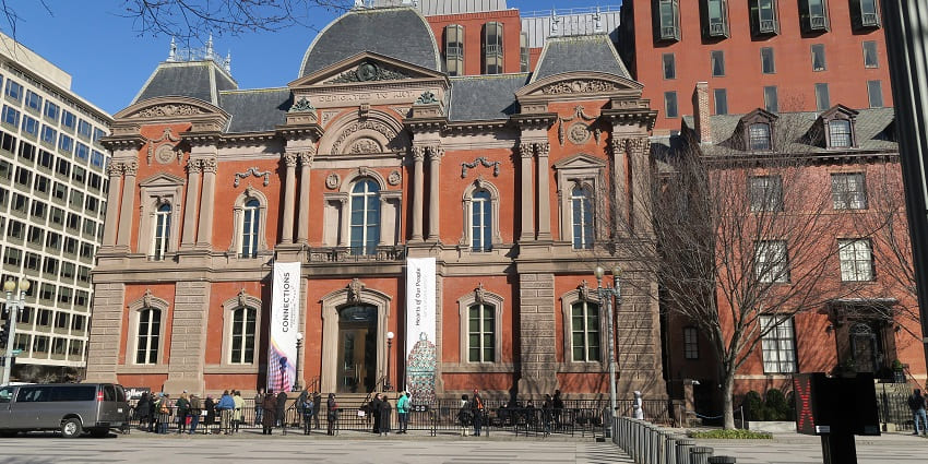 Visitors admiring the Renwick Gallery, one of the Smithsonian Institution museums.