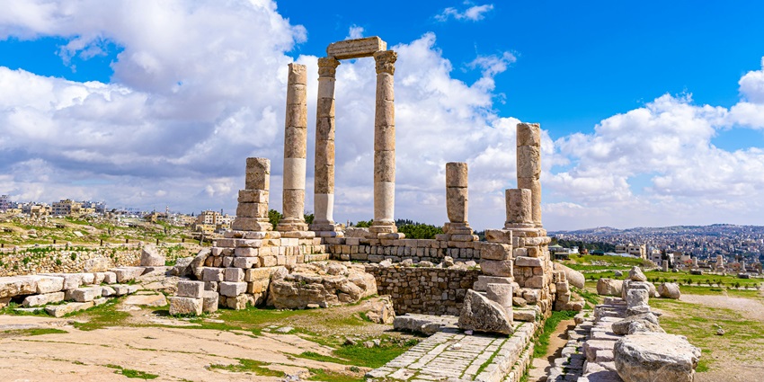 Historical site with ancient ruins and panoramic city views at the Amman Citadel.