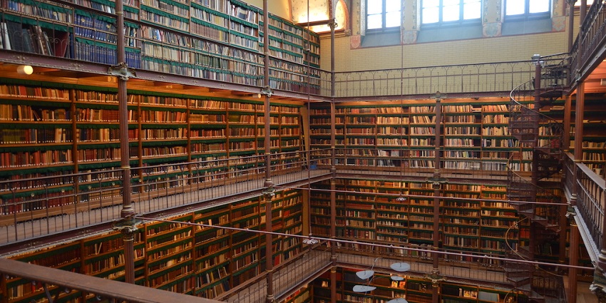 Modern library with extensive collections, reading spaces, and views.