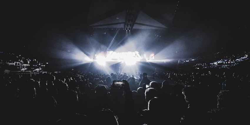 Crowd of people in the dark at Anemi Festival - one of the music festivals in Greece.