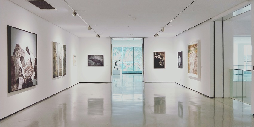 A picture of a library, highlighting resources on art galleries in Michigan for visitors.