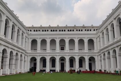 An image of the Art museum Kolkata showcasing vibrant photographic art in a spacious gallery