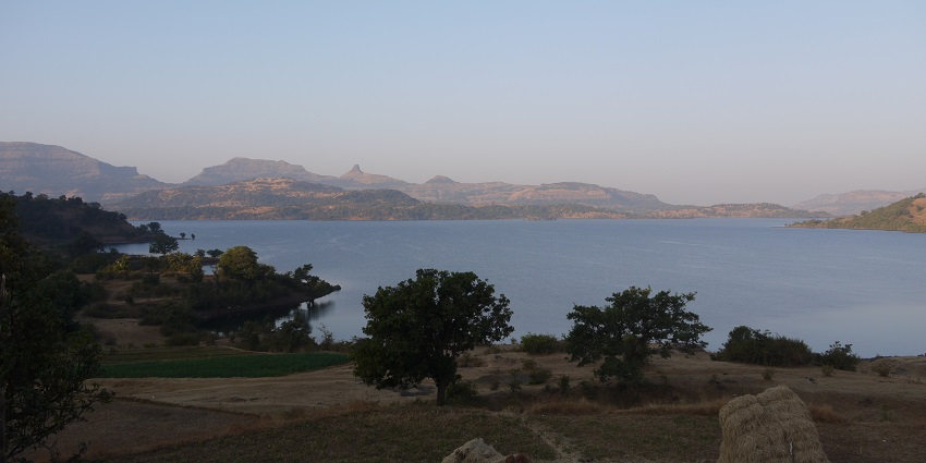 A scenic view of Bhandardara Lake, which is very ideal for Bhandardara trekking.