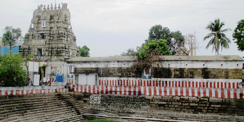 An image of the interior of Ashtabhuja Temple with a variety of flowers and decorations