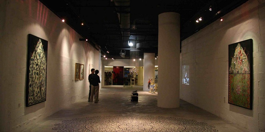 Contemporary art gallery showcasing modern Arab and international artists.