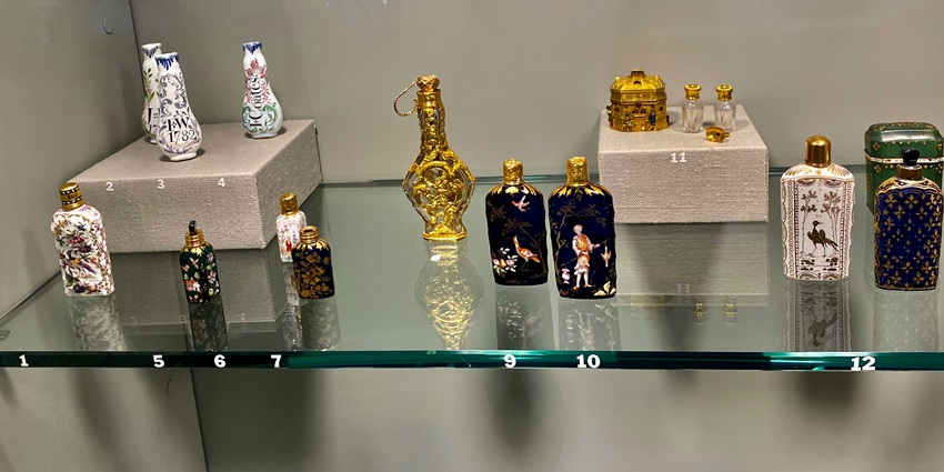 A picture of numerous perfume bottles placed on display at a mini perfume workshop in Paris