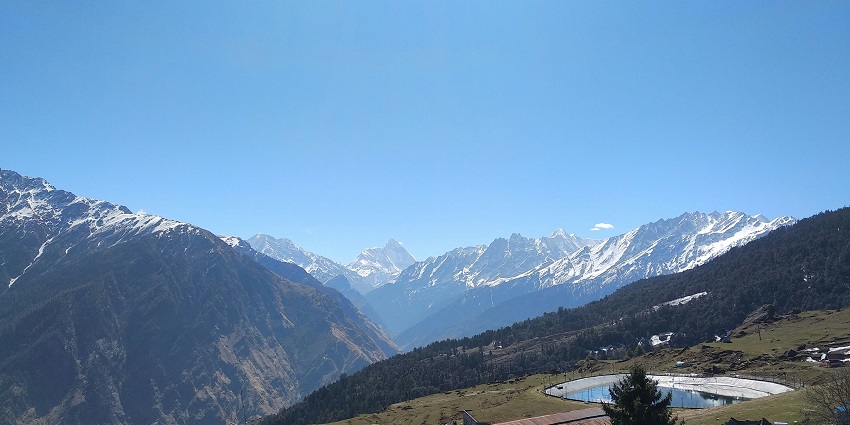 Experience camping in Auli offers stunning lake views and outdoor activities.