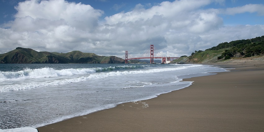 View of Baker Beach with the Golden Gate Bridge in the background.