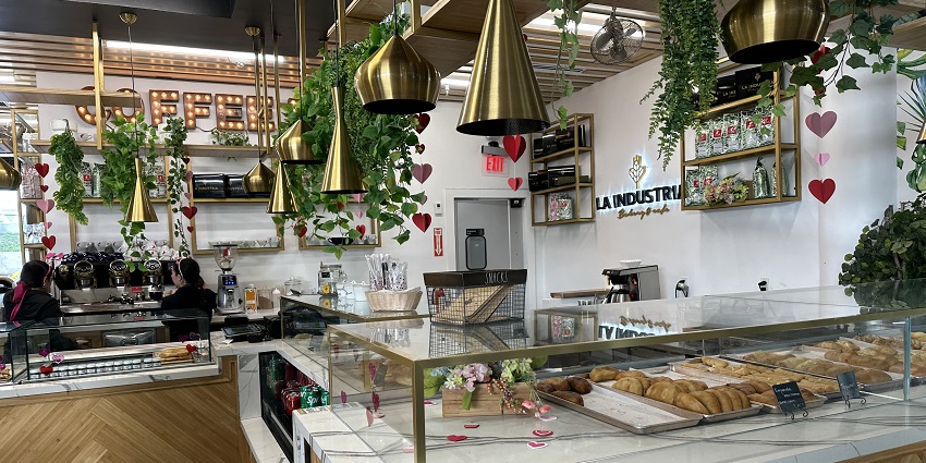 La Industria Café and Bakery at Bayside Marketplace, featuring outdoor seating.