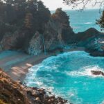 An image of a serene beach, soft sandy shores and natural landscape in Georgia.