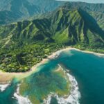 View of beautiful beaches in Hawaii with clear blue water and sandy shores.