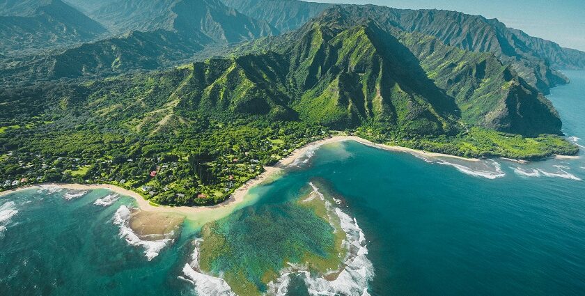 View of beautiful beaches in Hawaii with clear blue water and sandy shores.