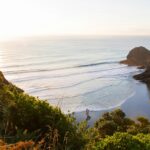 Image of beach view from top hill - Explore serene and calm beaches in New Zealand