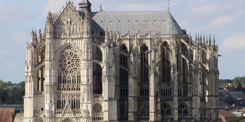 Beauvais Cathedral is a stunning Gothic cathedral featuring intricate designs and tall spires.