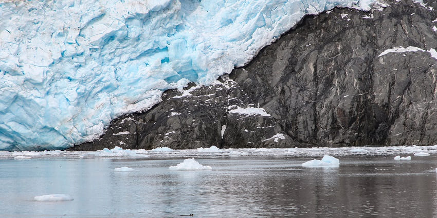 An image of Kenai Fjords National Park features glaciers, dramatic coastlines