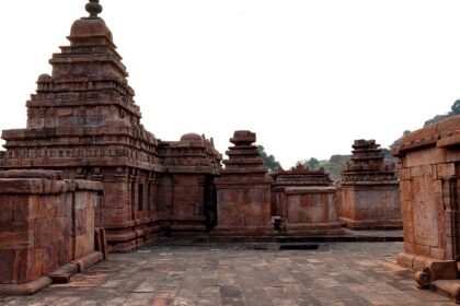 Image of a temple with historical significance architecture surrounded by lush greenery - Bhootnath temple