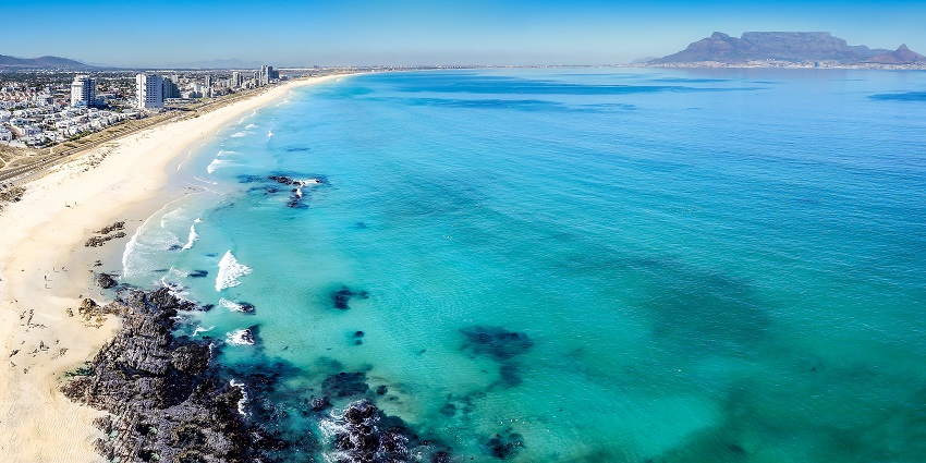 Witness the breathtaking scenery of Bloubergstrand, one of Cape Town beaches.