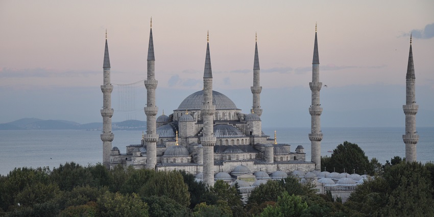 Places to visit in Istanbul in July include the mosque that is known for stunning blue tile interiors.