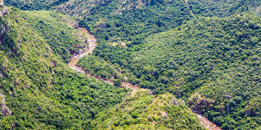 An aerial and mesmerising view of Blyde River Canyon amidst lush greenery