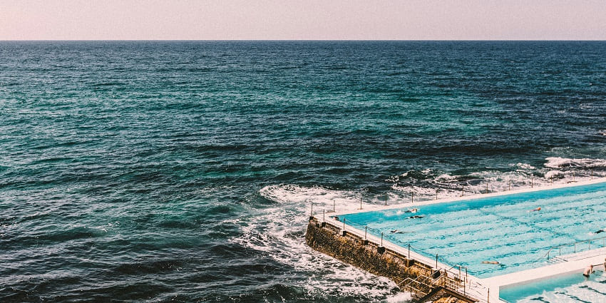 Bondi Beach is a bright and warm sandy beach which is famous for surfing too.