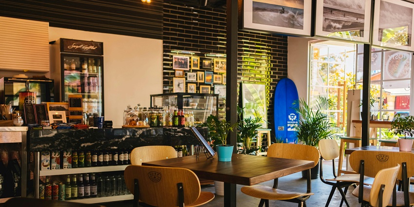 Books@Cafe is a cosy café and bookstore offering food, drinks, and ambience.