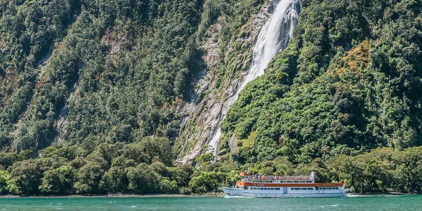 Witness Milford Sound’s iconic Bowen Falls, a must-visit New Zealand waterfall.
