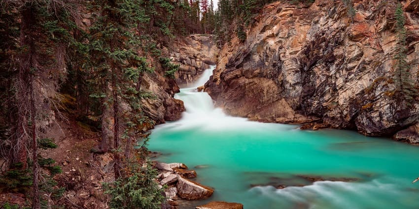 A scenic view of cascading waterfalls, a popular tourist destination