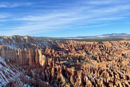 An image of an aerial view of Bryce Canyon National Park's unique rock formations.