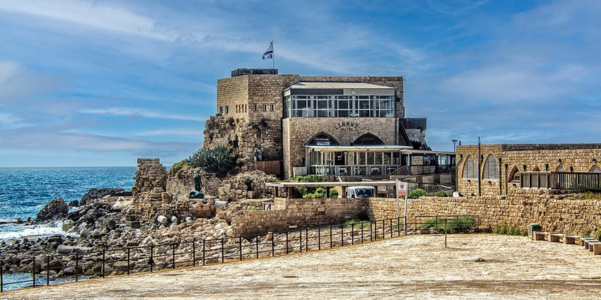 A distant picture of the ruins of an ancient city, one of the best places to visit in Israel