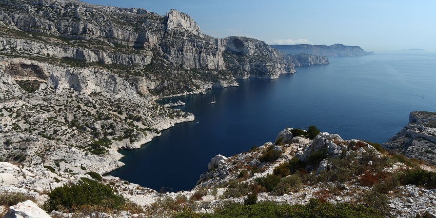 Secluded cove with pristine waters and scenic hiking trails.