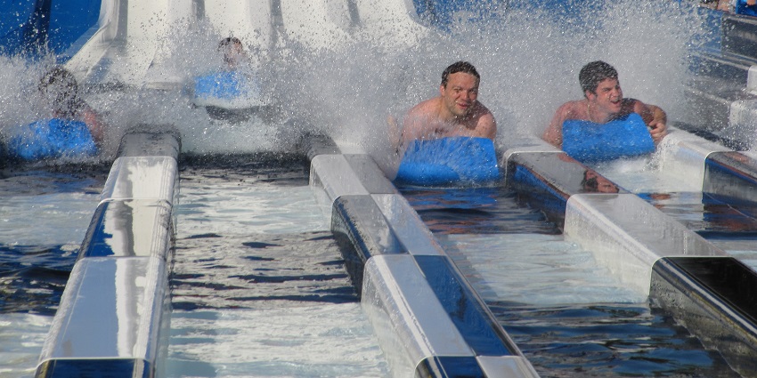 A vibrant view of a water park in Toronto Canada with pools and slides for a harmonious place.