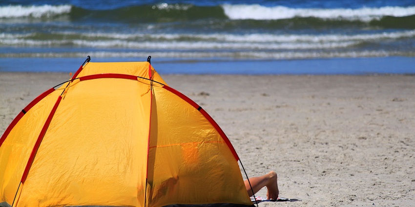 Beach camping in Rishikesh offers adventure activities and serene surroundings.
