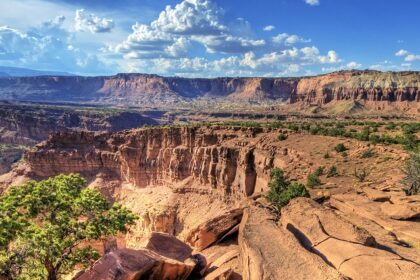 An image of the dramatic sandstone cliffs and layered rock formations.