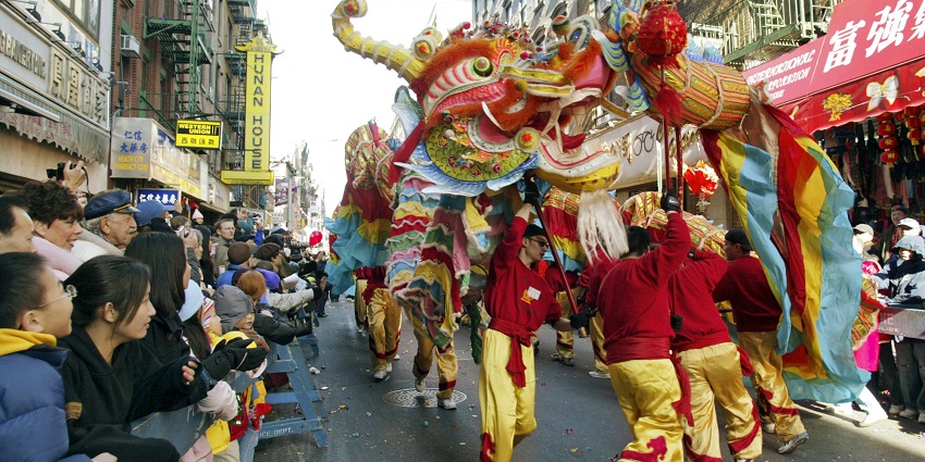 People watch the artist perform in the Chinese New Year Parade in Manhattan, New York