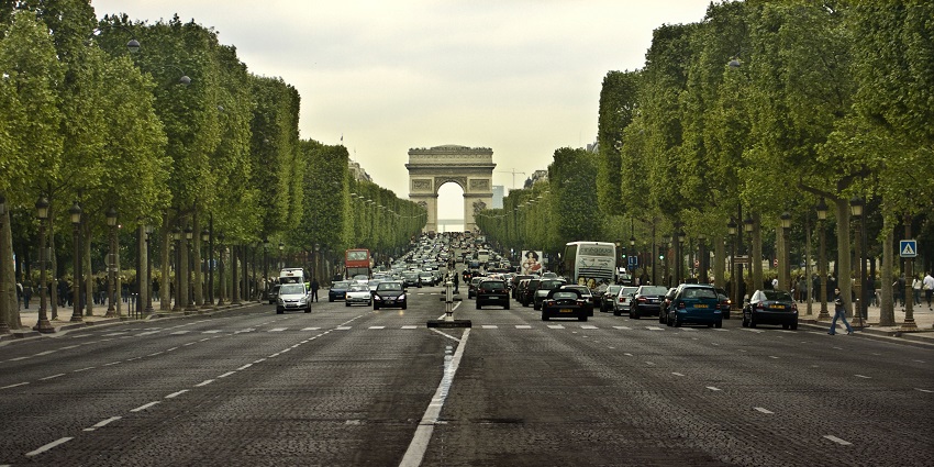 Champs-Élysées is among the best places for shopping in Paris with luxury shops, cafes, and historic landmarks.