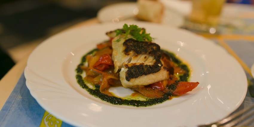 A glimpse of a charming Parisian bistro known for classic French dishes and ambiance.